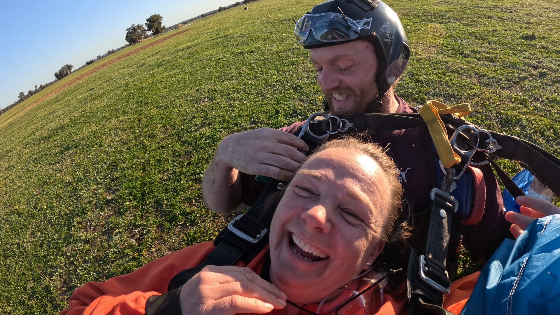 Tandem Skydive Perth, smiling skydivers after landing a parachute after skydiving over Hillman Farm Skydiving Club