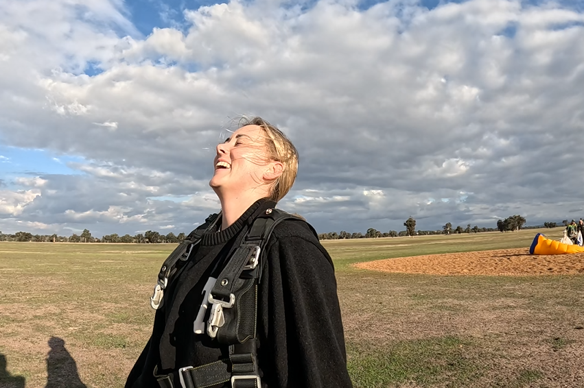 Tandem Skydive Customer Post Landing - The Smile Says It All