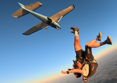 Close-up of a happy tandem skydiver and instructor during a jump at The Skydive School in Western Australia.