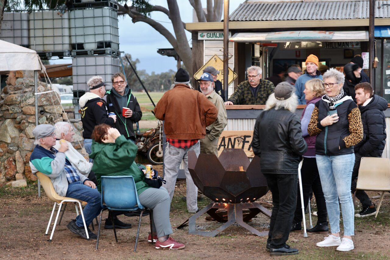 Skydiving from Perth 3 Skydivers and visitors relaxing together outside the clubhouse at Hillman Farm
