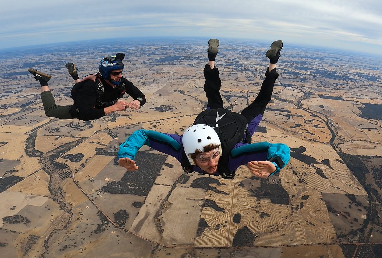 Learn to Skydive – AFF Course (deposit) 1 AFF student in freefall over Darkan WA